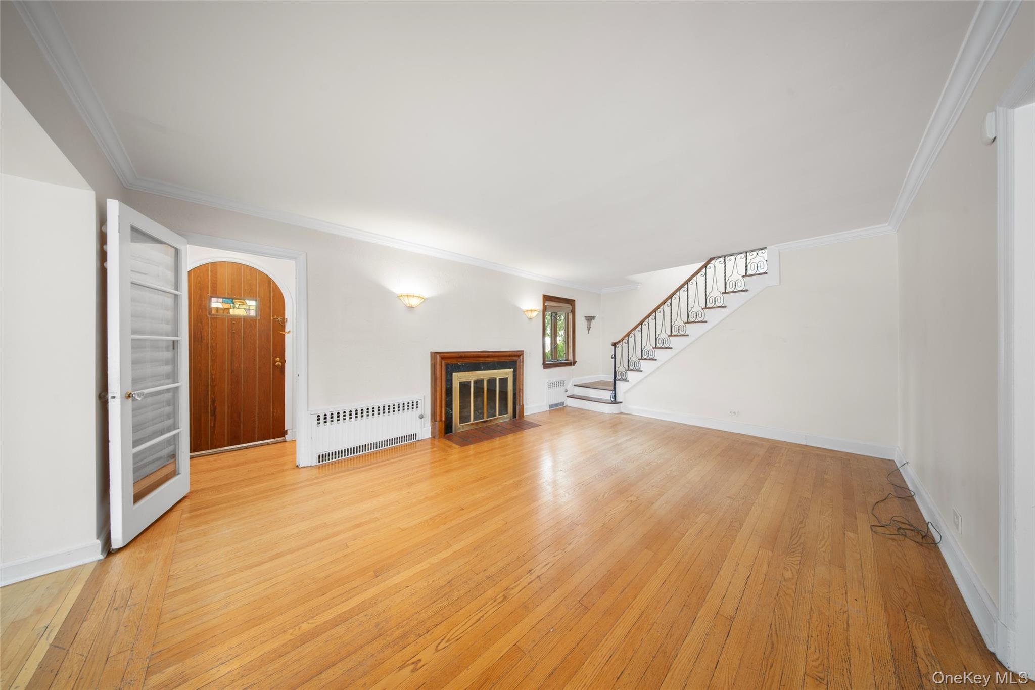 47-69 195th Street Queens, NY 11358 - Photo 4 of 12 a view of empty room with wooden floor