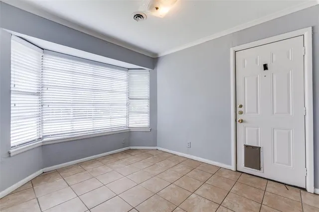 a view of an empty room with window