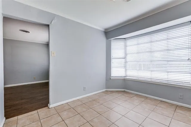 a view of an empty room with window