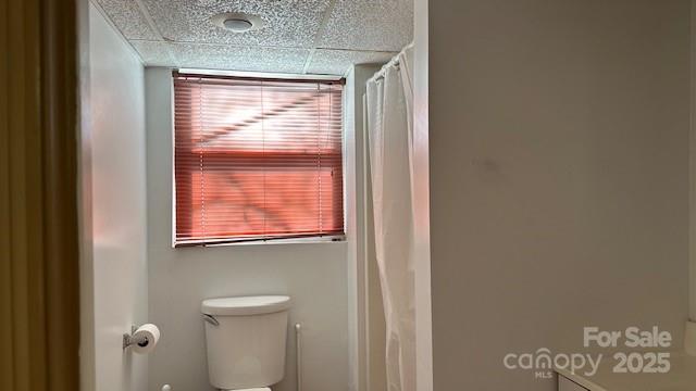 109 Delmar Road Shelby, NC 28152 - Photo 13 of 16 a bathroom with a toilet sink and mirror