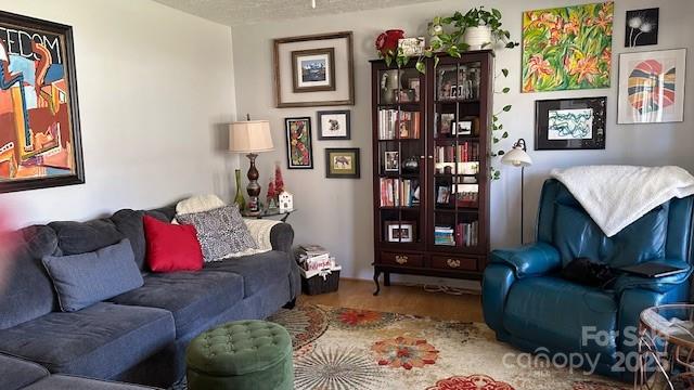 109 Delmar Road Shelby, NC 28152 - Photo 2 of 16 a living room with furniture and book shelf