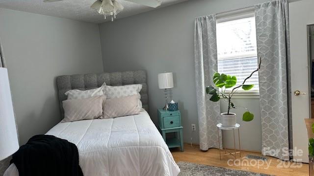 109 Delmar Road Shelby, NC 28152 - Photo 8 of 16 a bed sitting in a bedroom next to a window