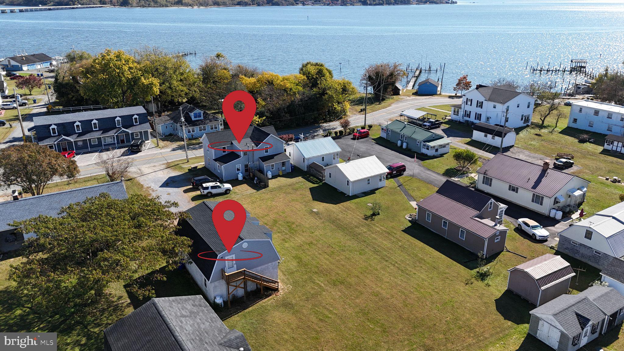 7267 Benedict Avenue Benedict, MD 20612 - Photo 1 of 28 a group of cars parked in a parking lot