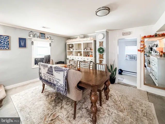 a kitchen with sink a stove and cabinets