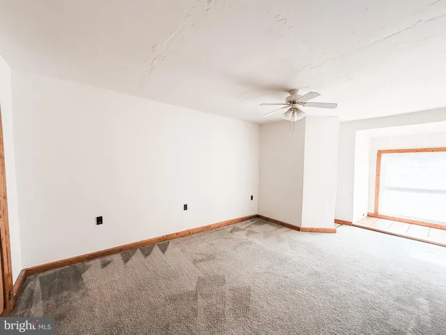 an empty room with natural light