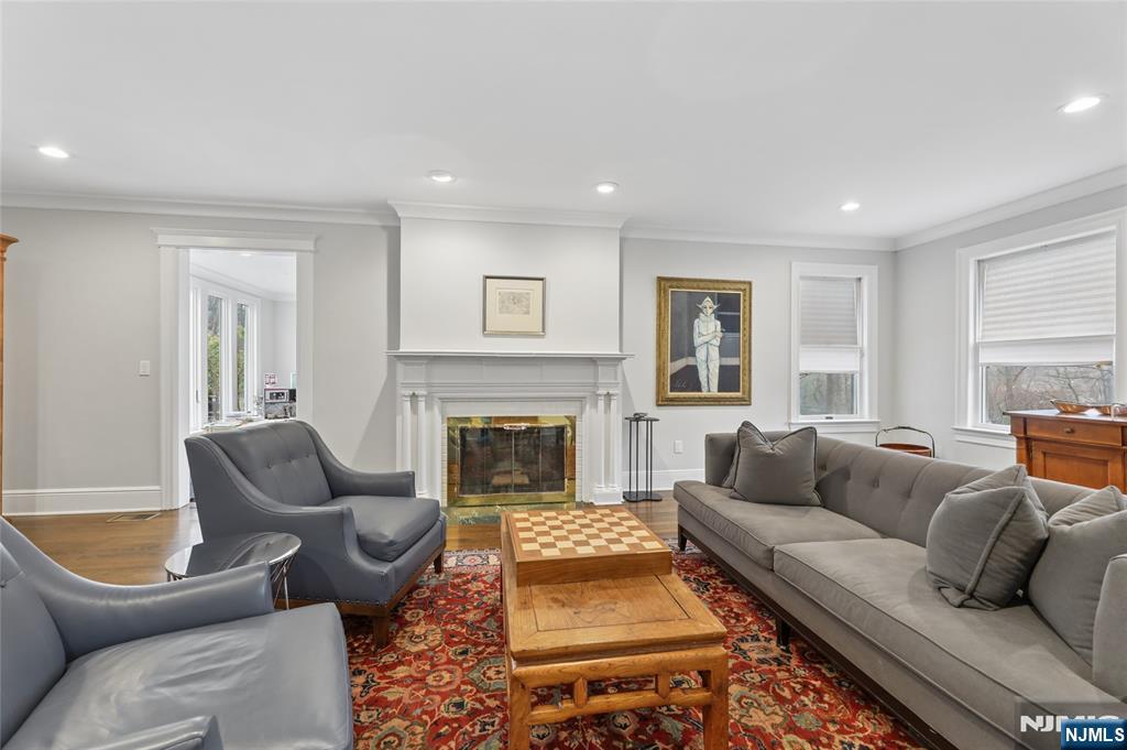 14 Old Smith Road Tenafly, NJ 07670 - Photo 14 of 50 a living room with furniture and a fireplace