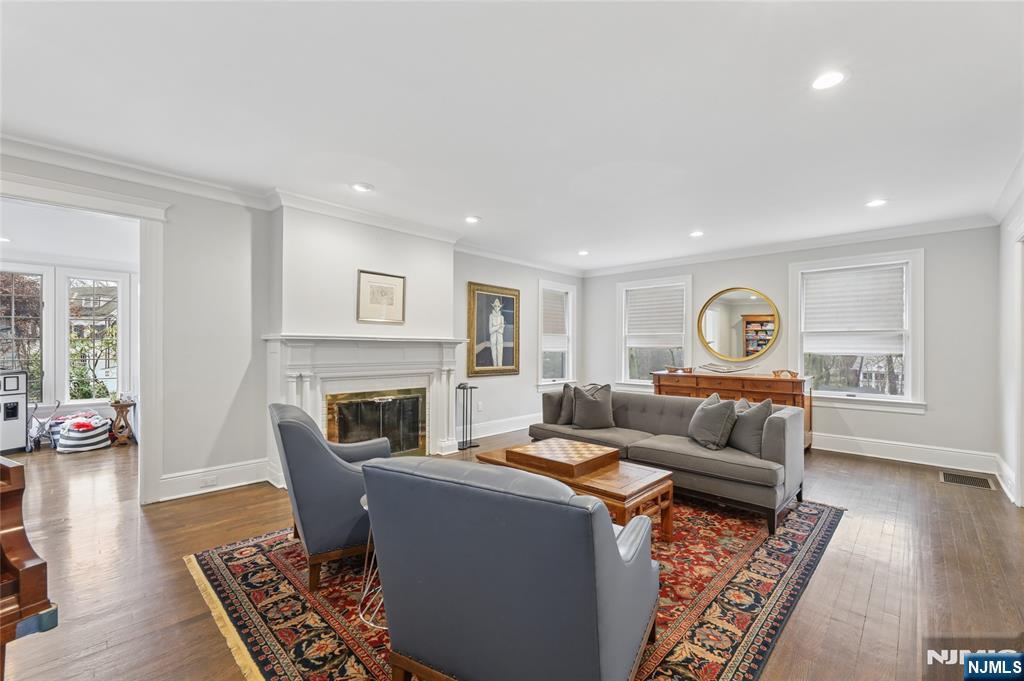 14 Old Smith Road Tenafly, NJ 07670 - Photo 16 of 50 a living room with furniture and a fireplace