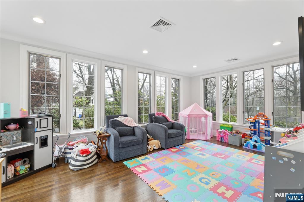 14 Old Smith Road Tenafly, NJ 07670 - Photo 17 of 50 a bedroom with furniture and a large window