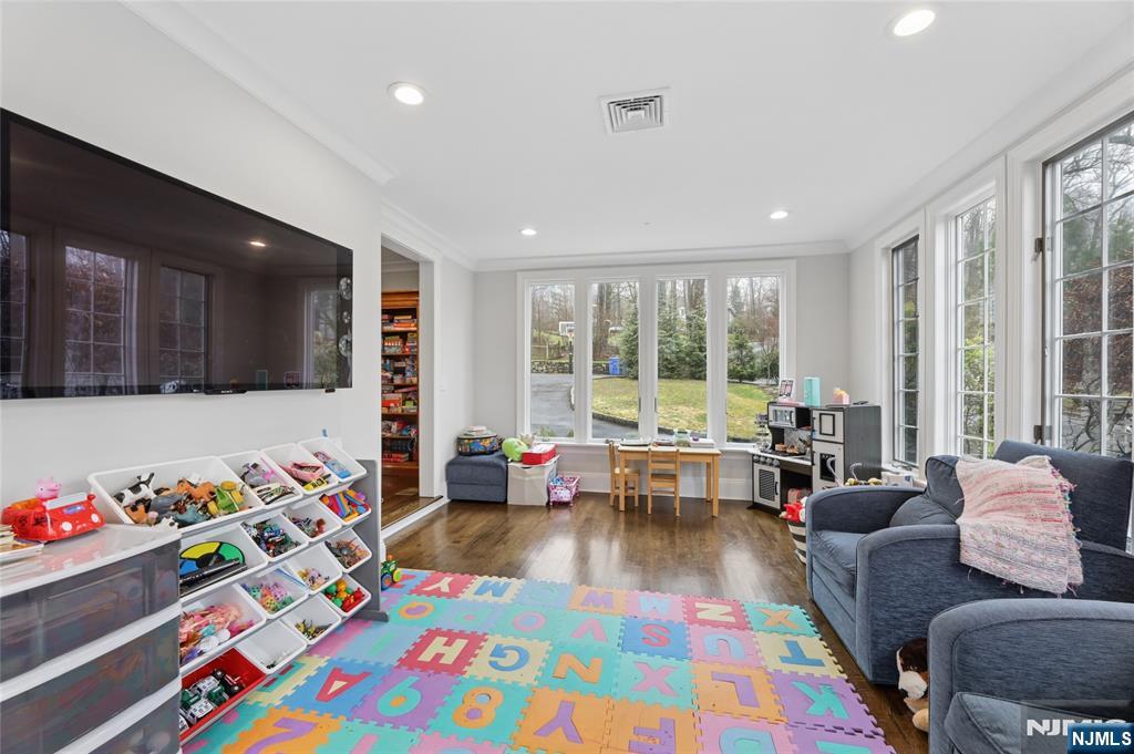 14 Old Smith Road Tenafly, NJ 07670 - Photo 18 of 50 a living room with furniture and a floor to ceiling window