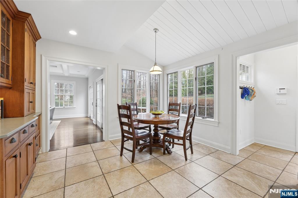 14 Old Smith Road Tenafly, NJ 07670 - Photo 24 of 50 a view of a dining room with furniture window and outside view