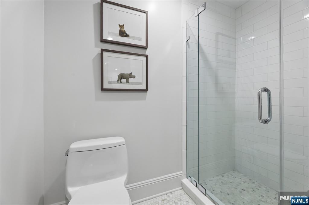 14 Old Smith Road Tenafly, NJ 07670 - Photo 36 of 50 a bathroom with a toilet and a shower