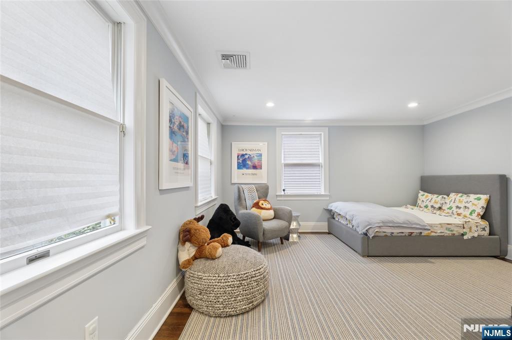 14 Old Smith Road Tenafly, NJ 07670 - Photo 37 of 50 a bedroom with furniture and a large window