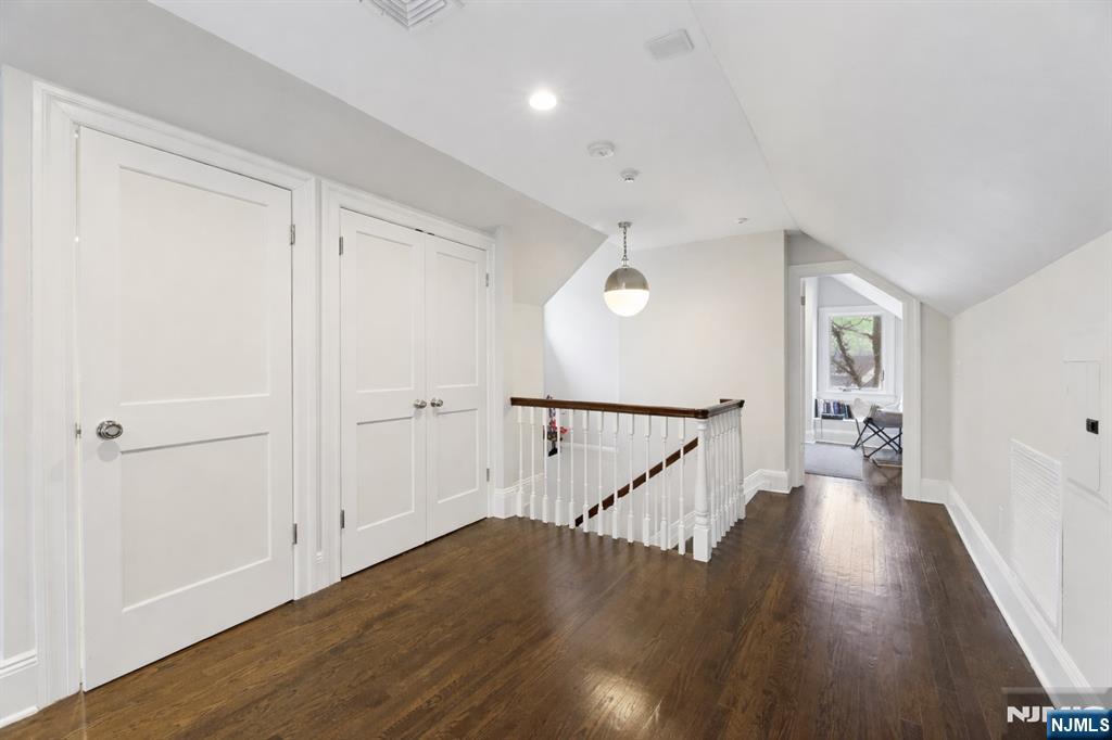 14 Old Smith Road Tenafly, NJ 07670 - Photo 42 of 50 a view of a hallway with wooden floor and entryway