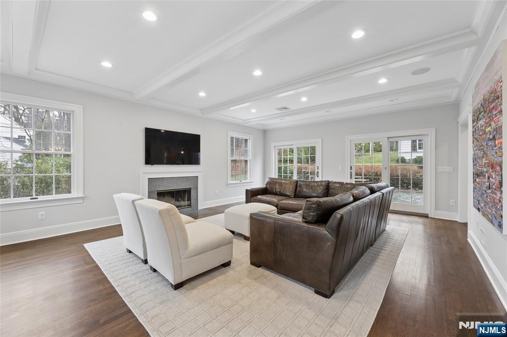 14 Old Smith Road Tenafly, NJ 07670 - Photo 10 of 50 a living room with furniture and a flat screen tv