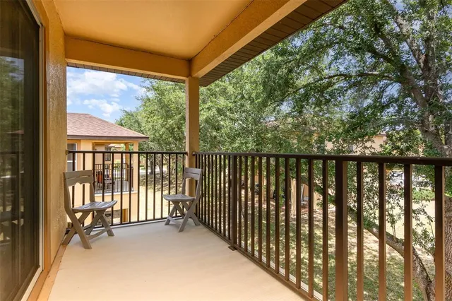 a view of a balcony with outdoor space