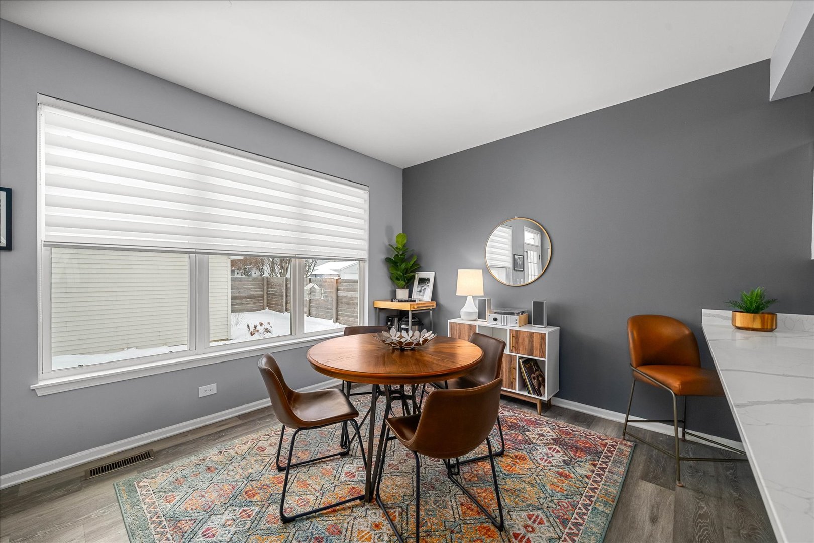 2077 Union Mill Drive Aurora, IL 60503 - Photo 7 of 18 a dining room with furniture a rug and a window