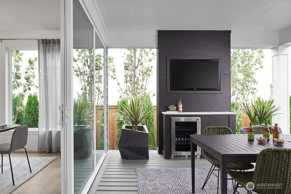 a living room with furniture and window
