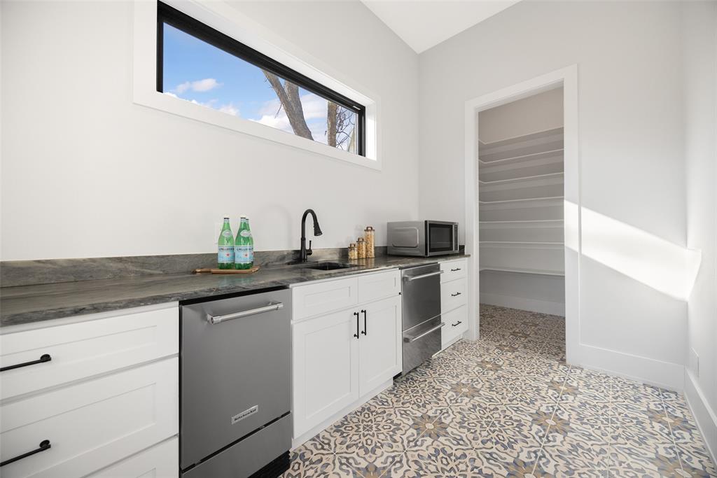 4737 Sugar Mill Road Dallas, TX 75244 - Photo 11 of 40 Butler's Pantry with storage, sink and extra dishwasher