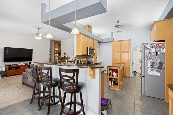 a view of a dining room kitchen and a window