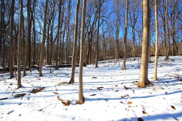a view of swimming pool with a sitting area