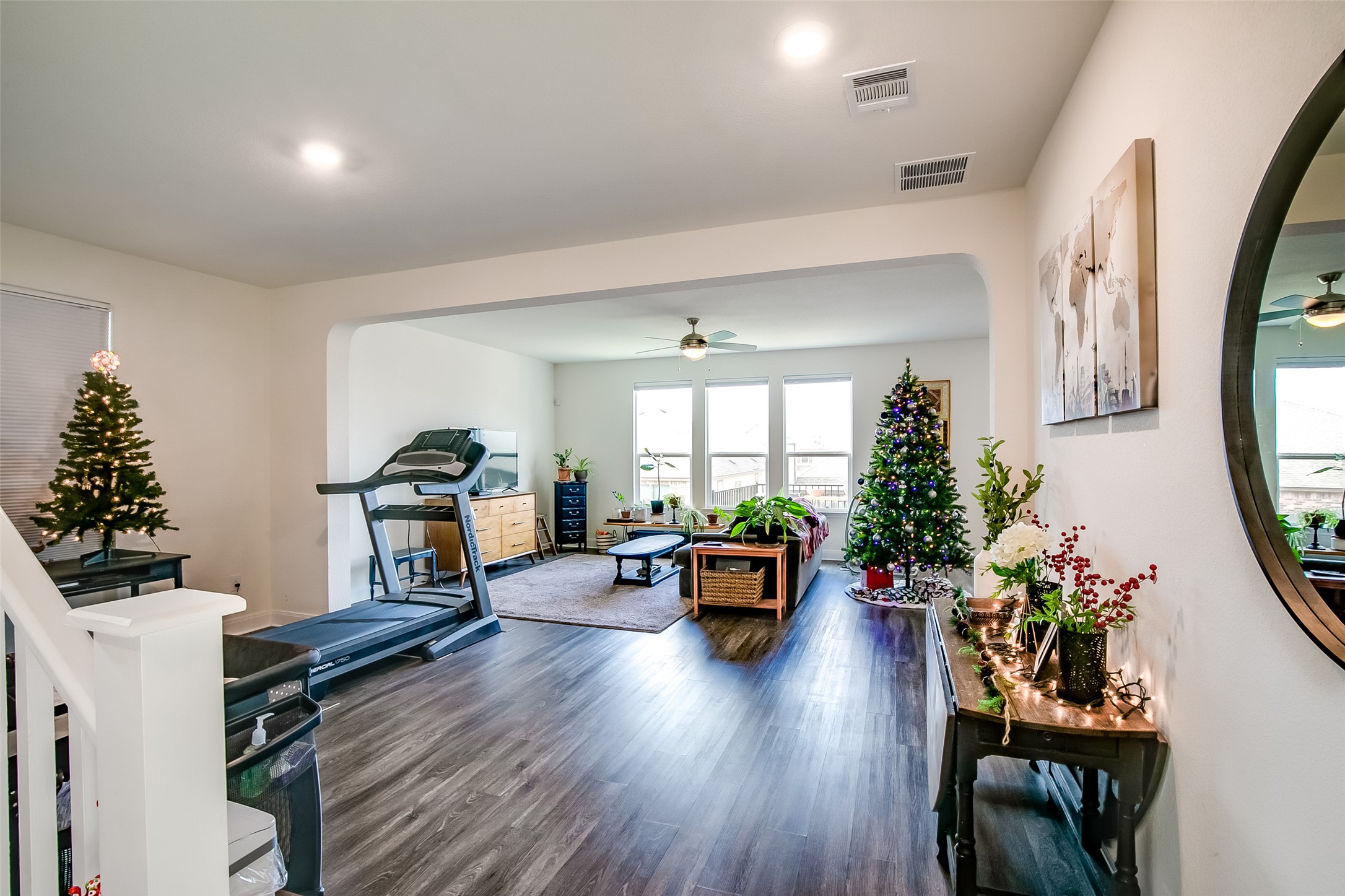 7616 Groundhog Way Austin, TX 78744 - Photo 5 of 34 a living room with furniture dining room and wooden floor