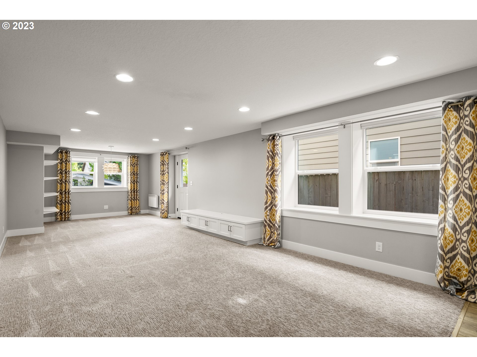 3917 Southwest Stephenson Street Portland, OR 97219 - Photo 28 of 34 a view of an empty room with a window