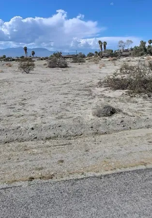 a view of beach and an ocean