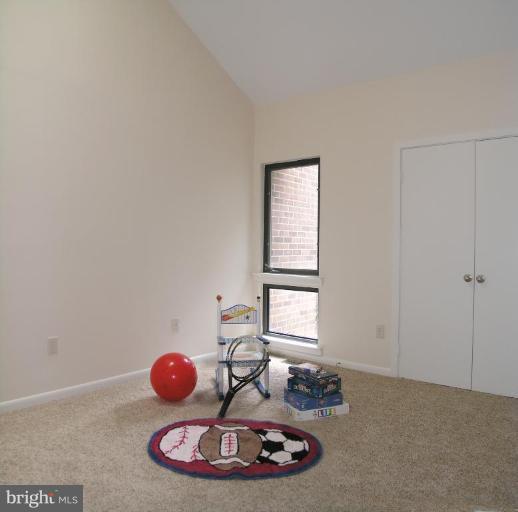 10999 Thrush Ridge Road Reston, VA 20191 - Photo 12 of 24 a room with a mirror and a window