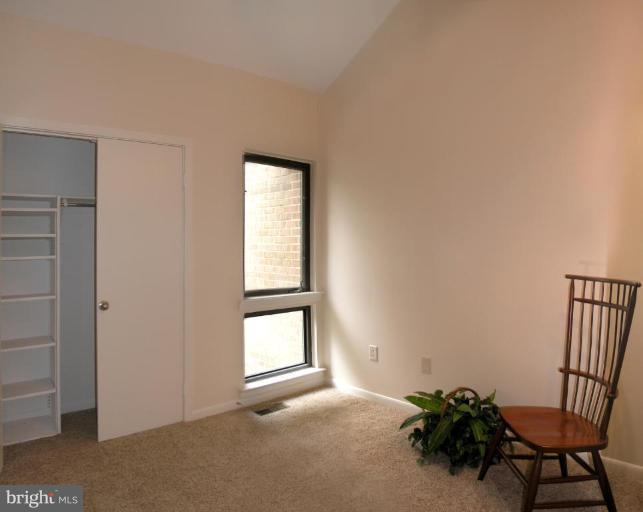 10999 Thrush Ridge Road Reston, VA 20191 - Photo 14 of 24 an empty room with windows and closet