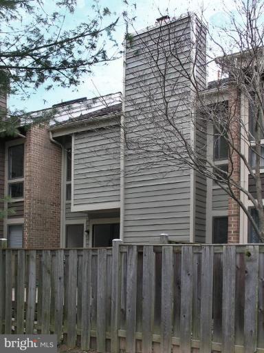 10999 Thrush Ridge Road Reston, VA 20191 - Photo 17 of 24 a view of a house with a window