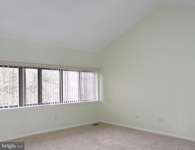 10999 Thrush Ridge Road Reston, VA 20191 - Photo 8 of 24 an empty room with a window