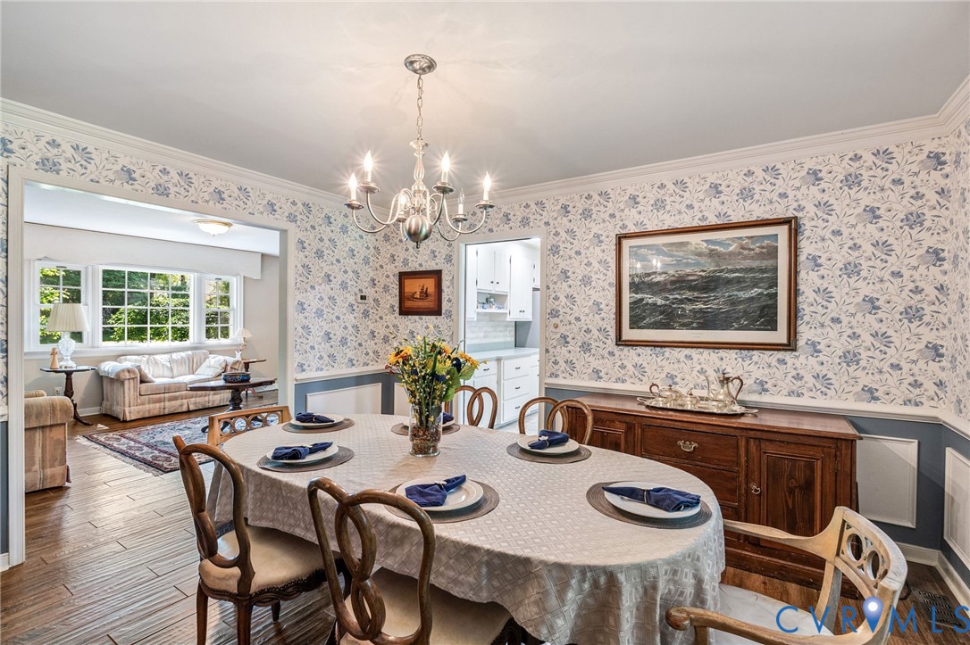 5700 Elfinwood Road Chester, VA 23831 - Photo 11 of 38 a view of a dining room with furniture and wooden floor