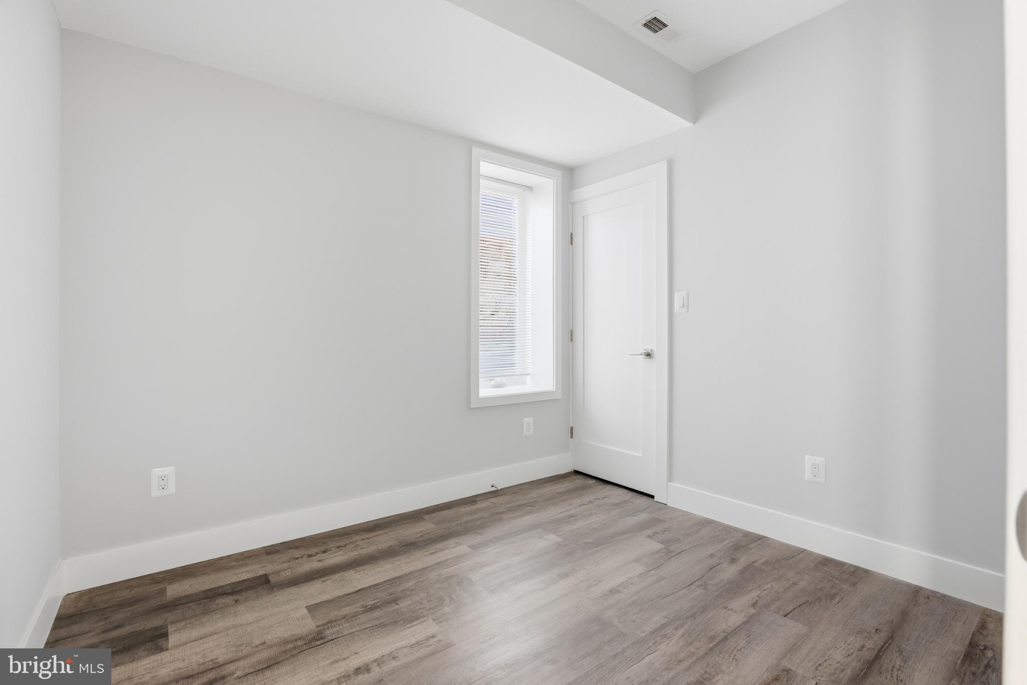 2600 4th Street Northeast, Unit A Washington, DC 20002 - Photo 17 of 33 wooden floor in an empty room