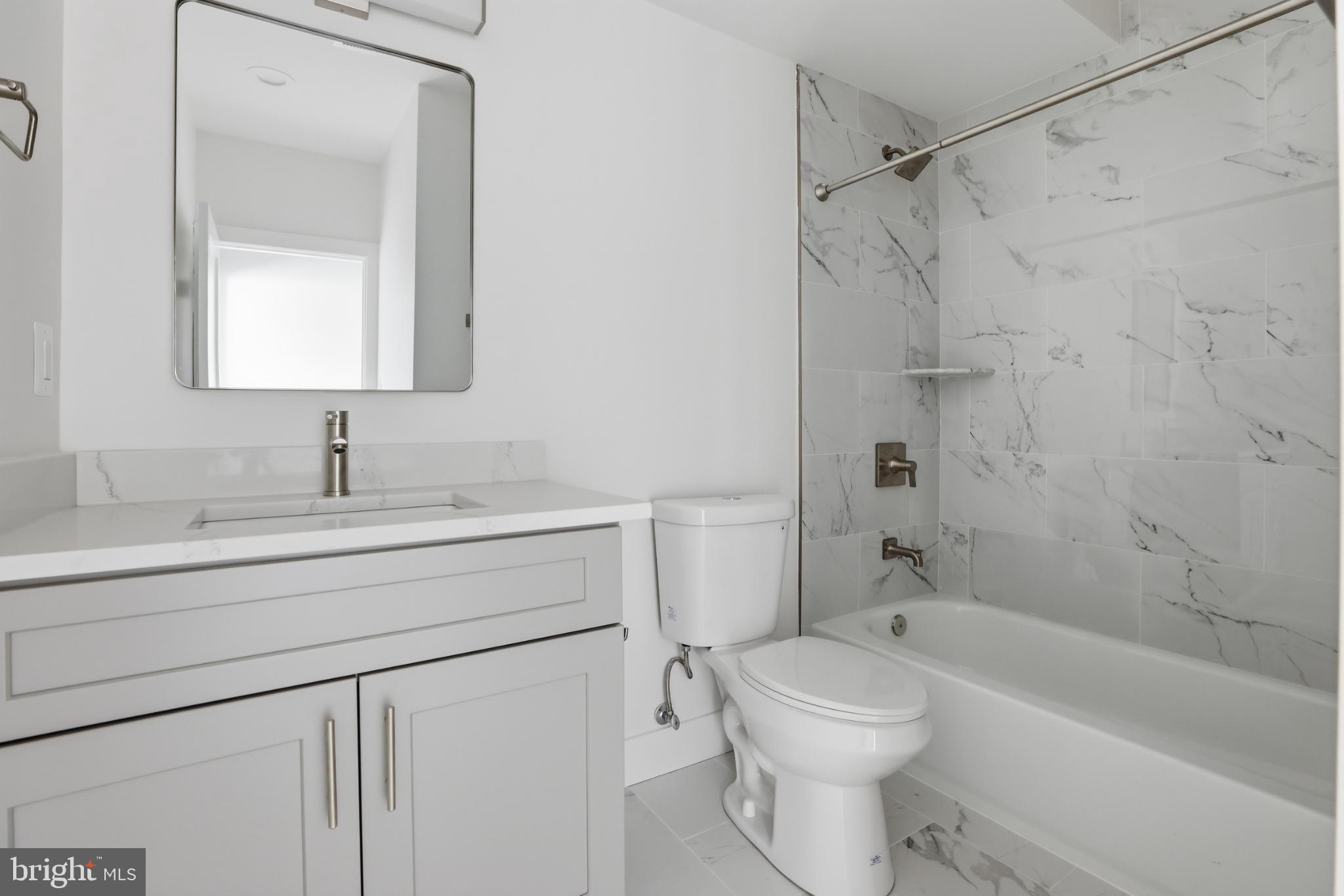 2600 4th Street Northeast, Unit A Washington, DC 20002 - Photo 27 of 33 a bathroom with a sink toilet and shower