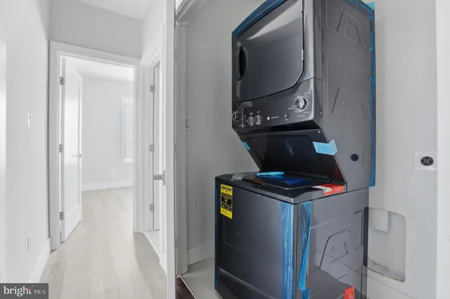 a kitchen with a stove and a microwave