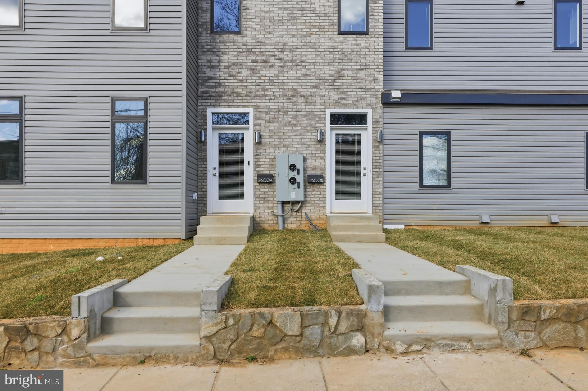 2600 4th Street Northeast, Unit A Washington, DC 20002 - Photo 3 of 33 a view of a brick house with many windows