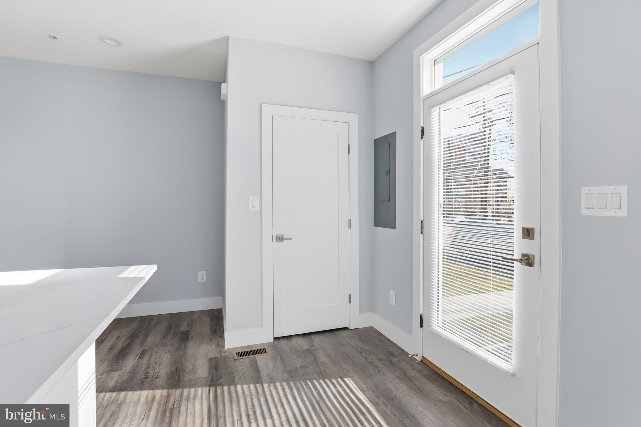 2600 4th Street Northeast, Unit A Washington, DC 20002 - Photo 5 of 33 a view of a room with wooden floor and windows