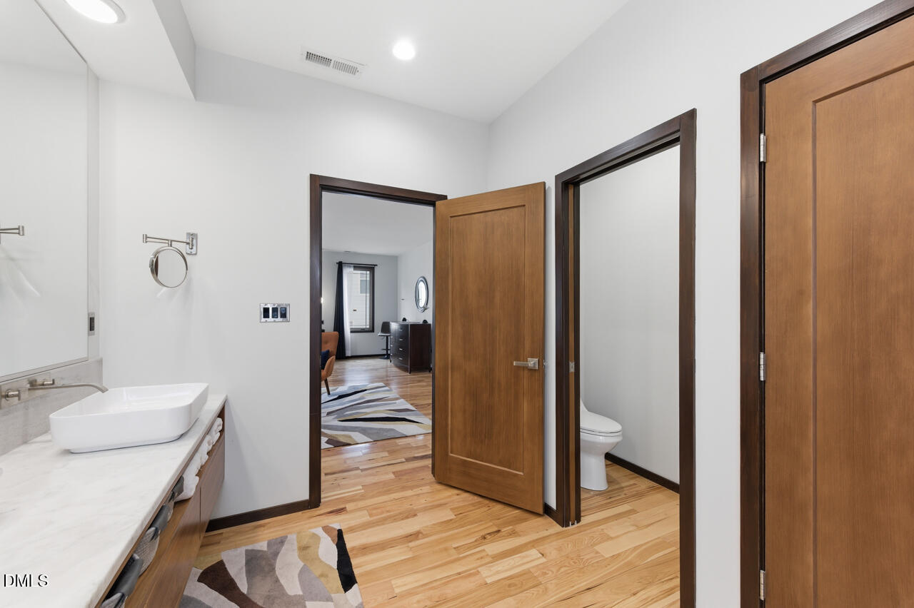 3315 Denada Path Durham, NC 27707 - Photo 49 of 74 a bathroom with a sink and a mirror
