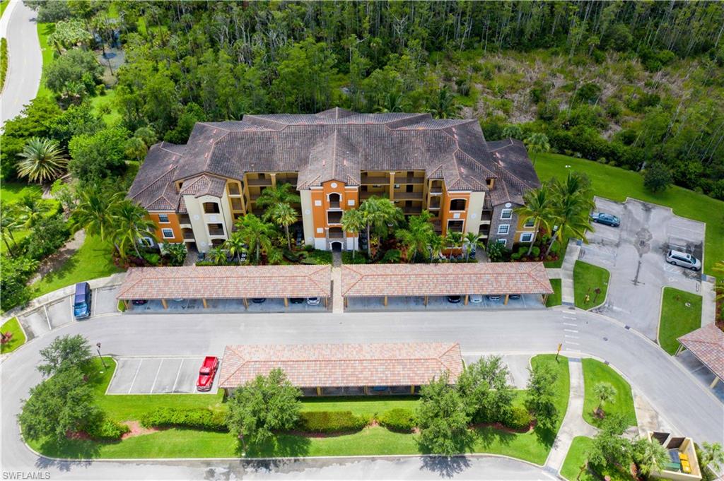 9715 Acqua Court, Unit 136 Naples, FL 34113 - Photo 22 of 24 an aerial view of a house