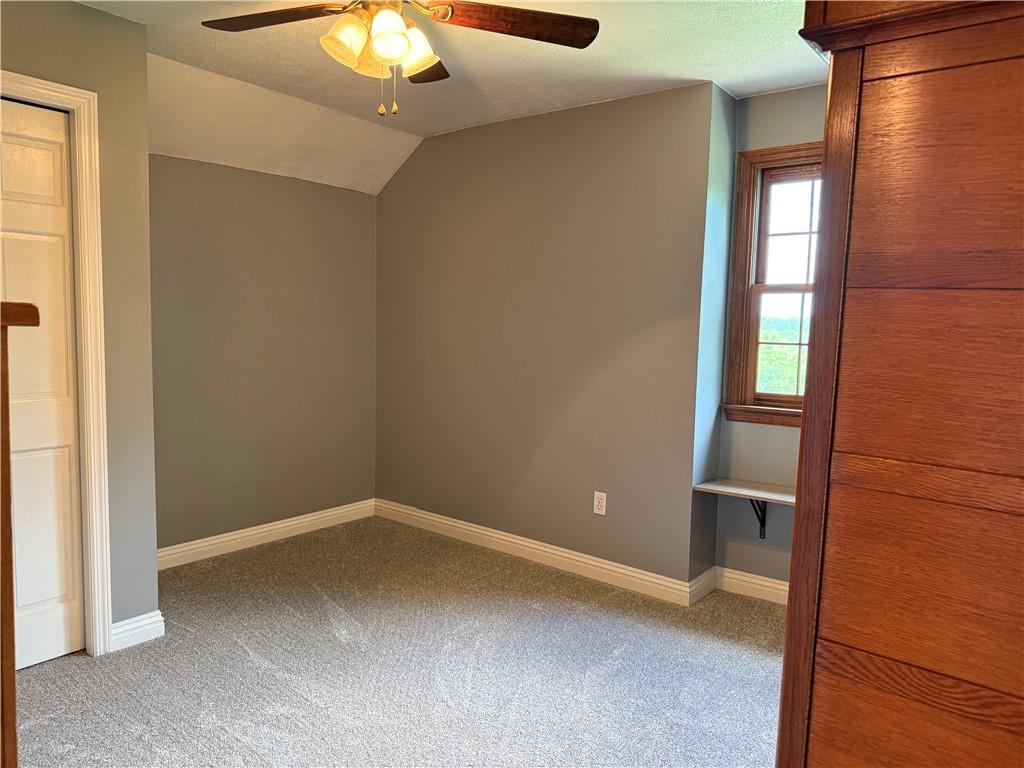 293 Sandy Hill Road Valencia, PA 16059 - Photo 40 of 50 a view of an empty room with a chandelier fan