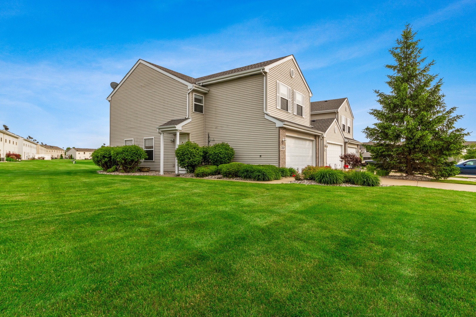 25130 Faraday Road Manhattan, IL 60442 - Photo 2 of 15 a front view of a house with a yard
