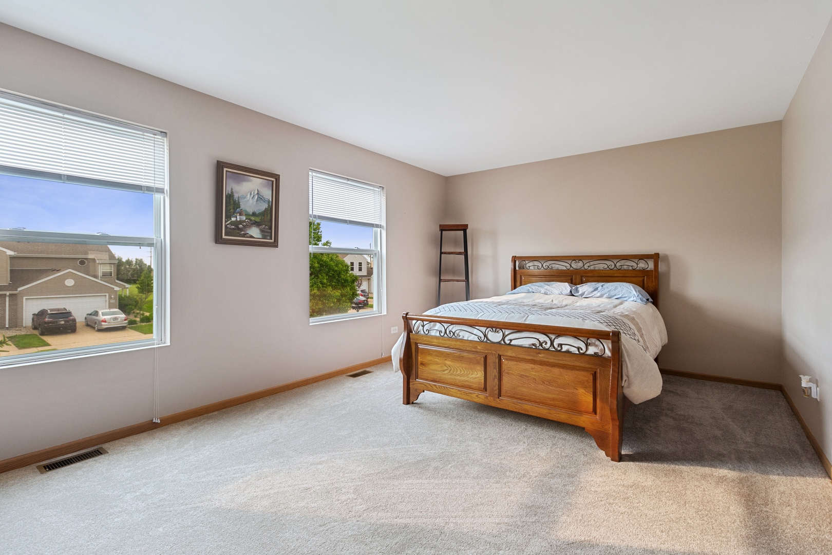 25130 Faraday Road Manhattan, IL 60442 - Photo 7 of 15 a bedroom with a bed and window