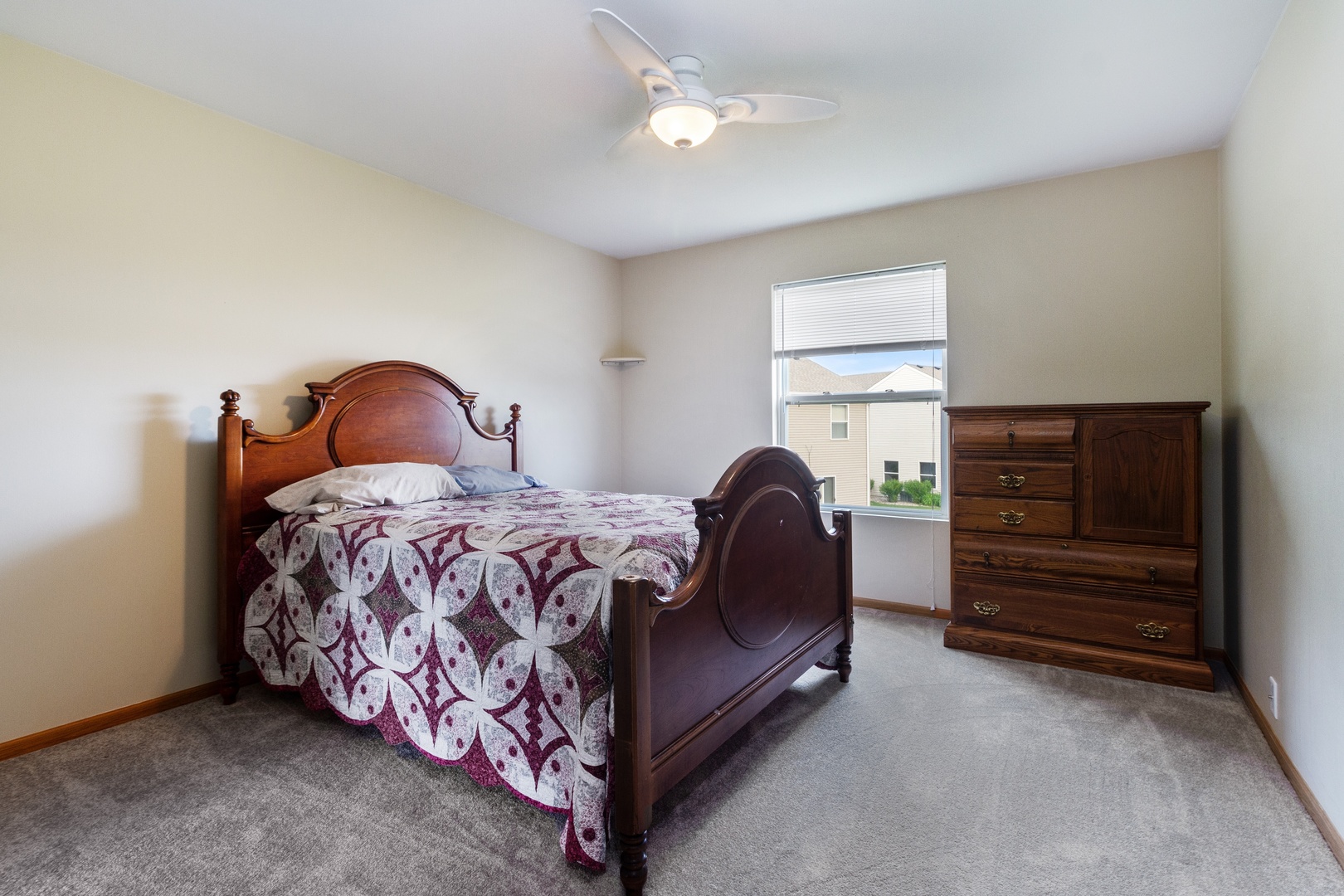25130 Faraday Road Manhattan, IL 60442 - Photo 10 of 15 a bedroom with a bed and dresser
