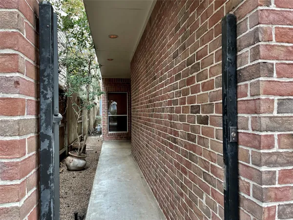 a view of a brick buildings with many windows