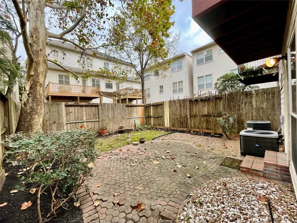 a view of a back yard of the house