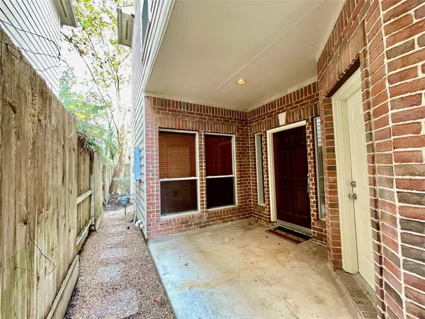 a view of a house with a wooden door