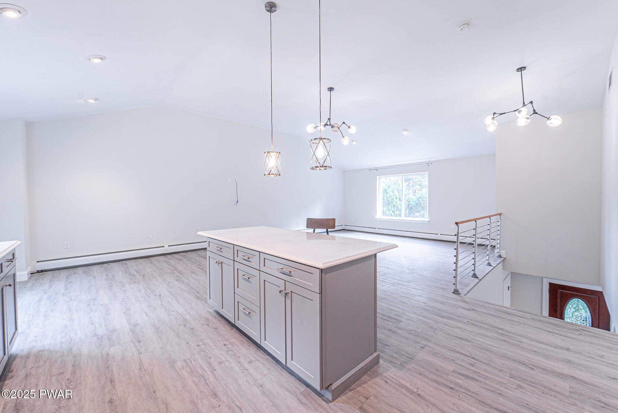 153 Hatton Road Hawley, PA 18428 - Photo 8 of 38 a kitchen with a wooden floor and window