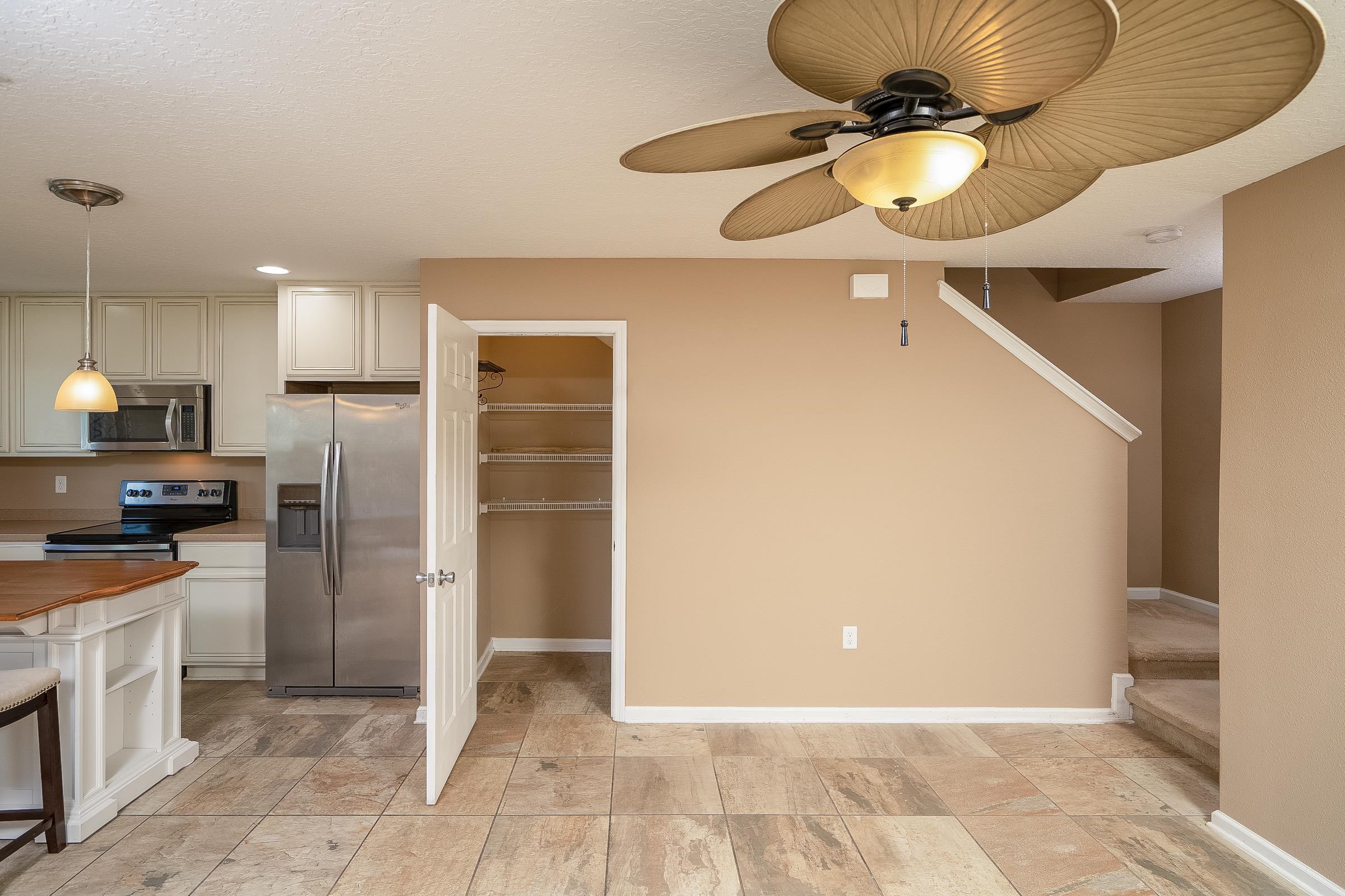 183 Islander Drive St. Augustine, FL 32080 - Photo 19 of 36 a view of a kitchen with a sink and a chandelier