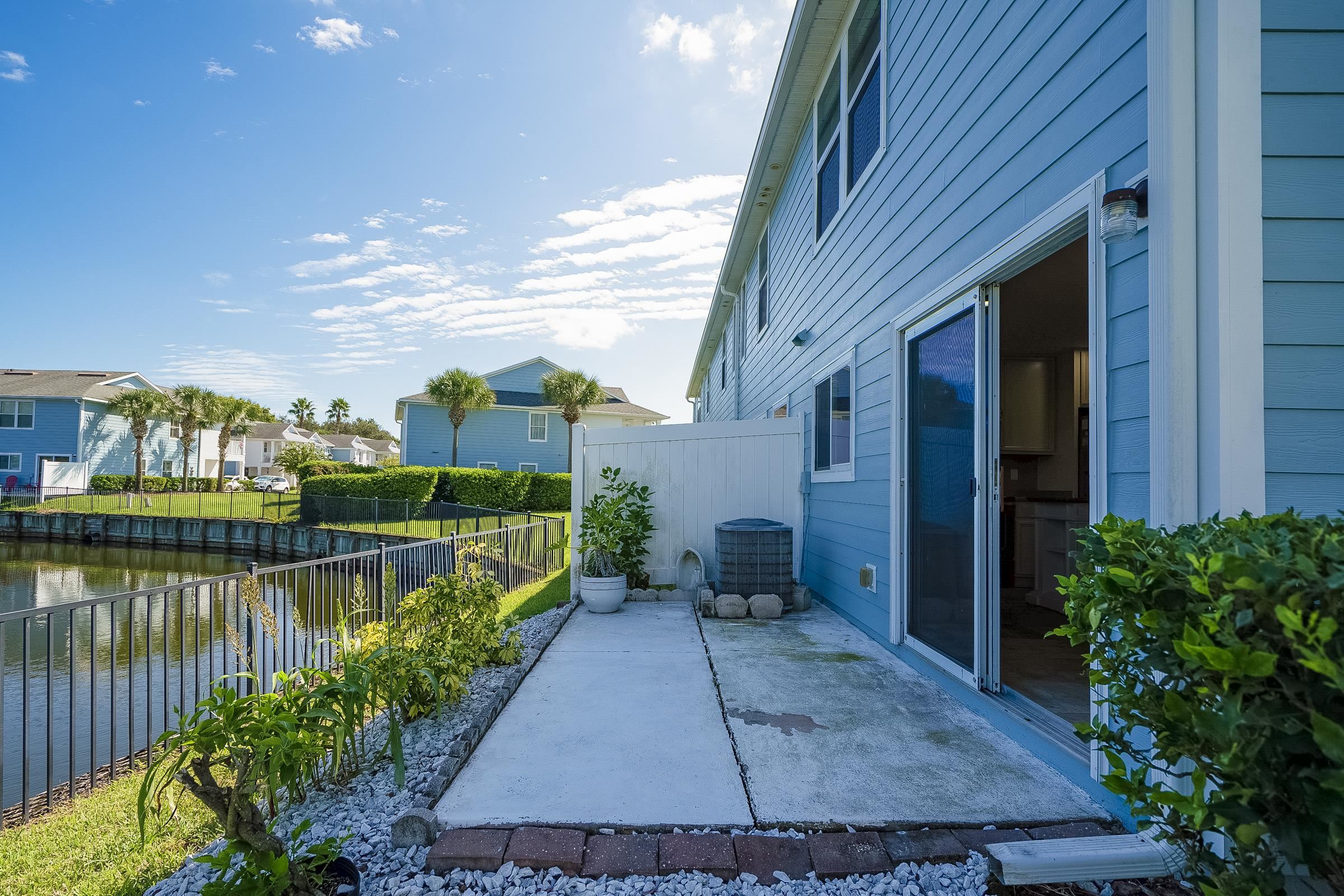 183 Islander Drive St. Augustine, FL 32080 - Photo 22 of 36 a view of a house with a garden