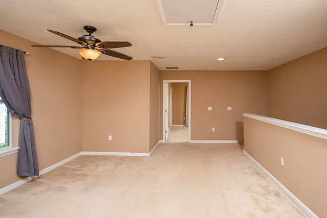 a view of entryway with a chandelier